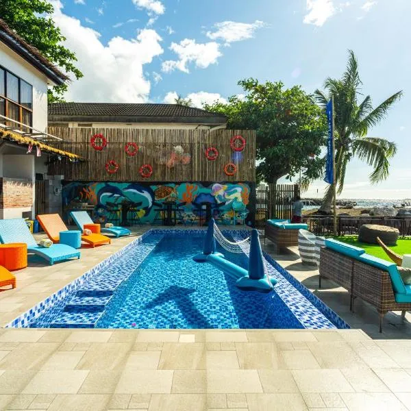 UNWND Boutique Hotel Camiguin، فندق في مامباجاو