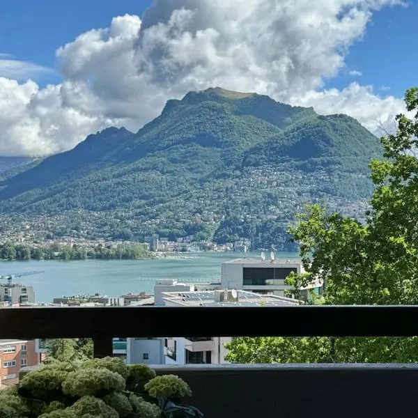 Panorama Suite in Lugano - Pazzallo, отель в городе Моркоте