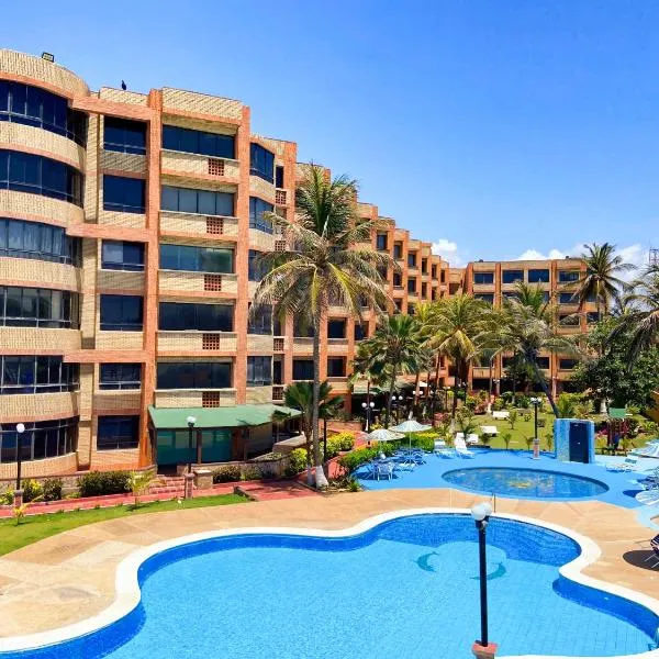 Apartamento en tucacas Cocotero mar 2 con la playa a tus pies, hótel í Tucacas