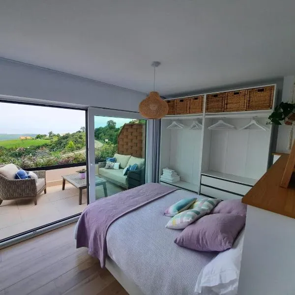 Vistas al mar y con jardín - Casa Abelia, hotelli kohteessa Comillas