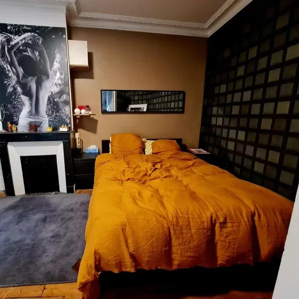 grande chambre dans appartement cosi, hotel en París