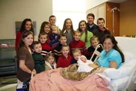 The entire Duggar family in hospital just after the birth of baby number 18, Jordyn-Grace Makiya.