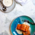 Air Fried Salmon on a plate with Yogurt sauce