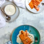 Air Fried Salmon on a plate with Yogurt sauce