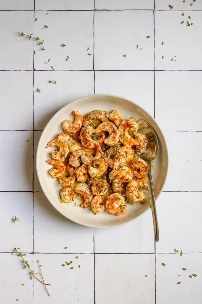 spot prawn recipe served with butter sauce in serving bowl.