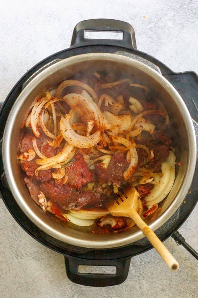 Ground Meat, Onion + Spices in the Instant Pot.