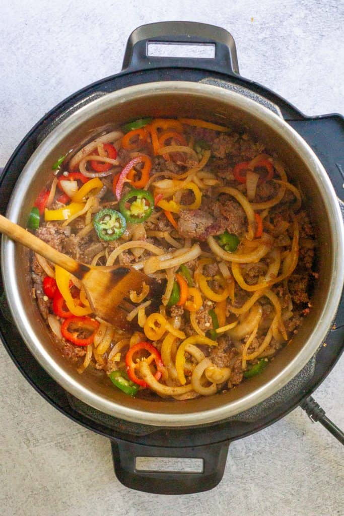 Peppers Added to Venison Chili Mixture.