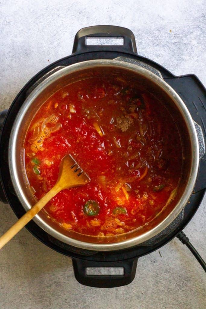 Adding Pureed Tomatoes to the Chili