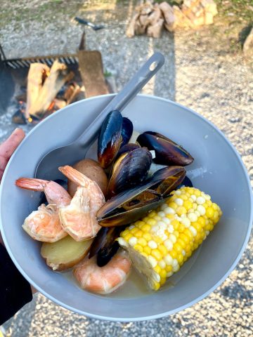 Campfire shrimp boil in bowl.