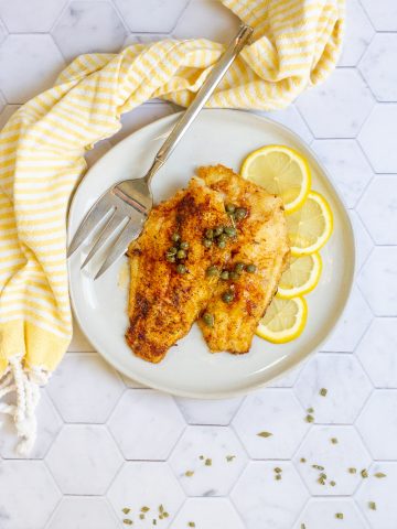 pan-seared catfish on a serving plate.