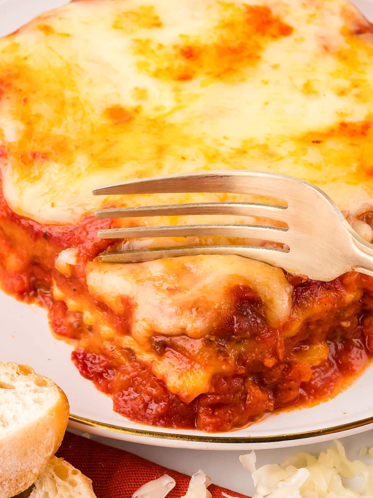 Using a fork to dig into a Lazy Lasagna.