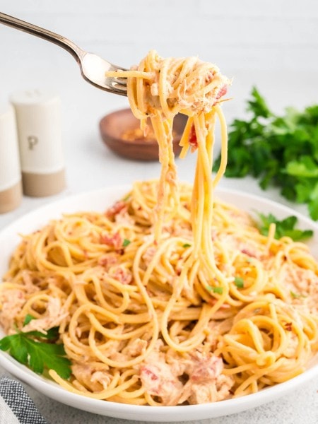 A forkful of Crockpot Chicken Spaghetti.