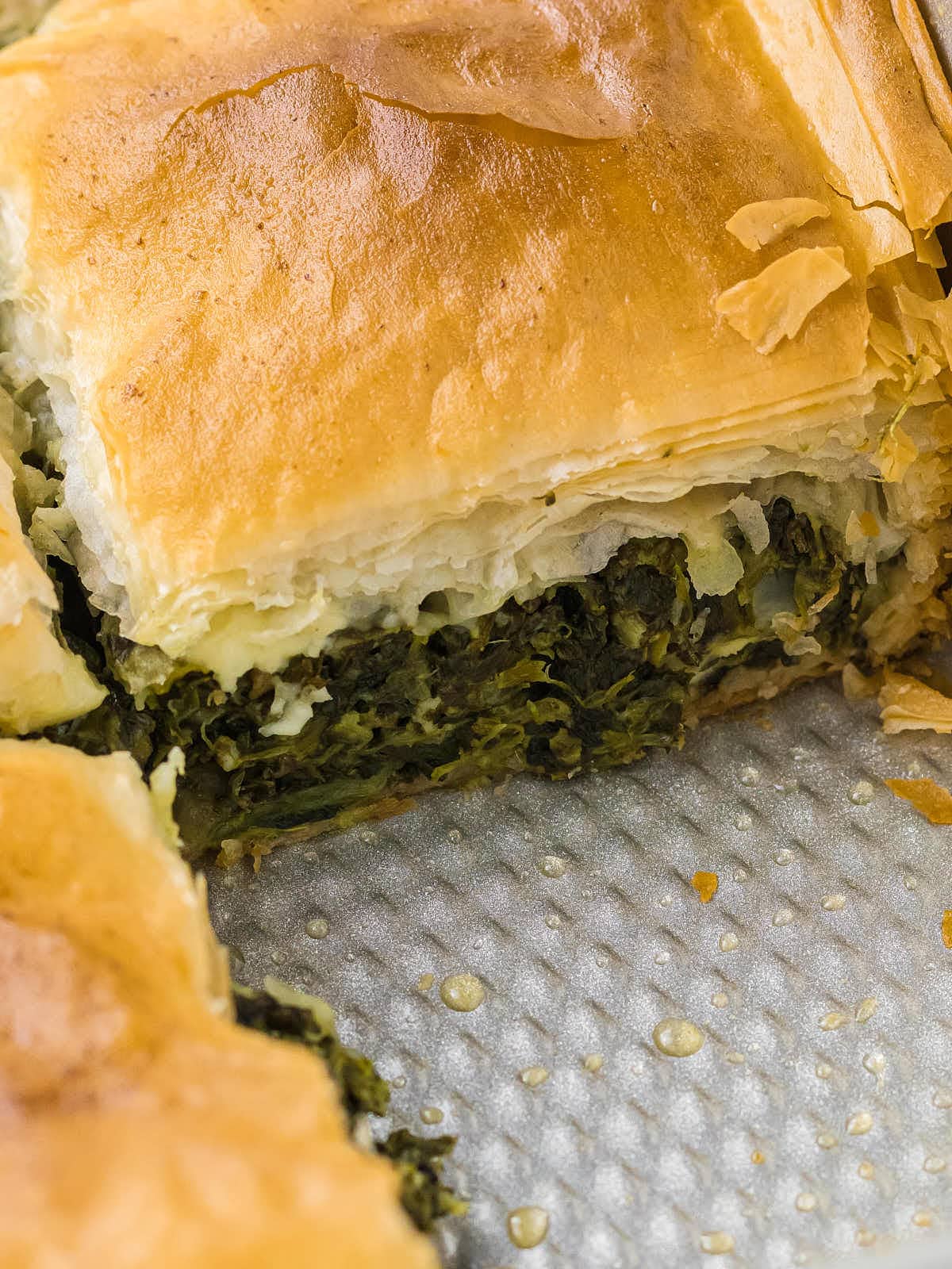 Topdown view of Spanakopita in a baking sheet.