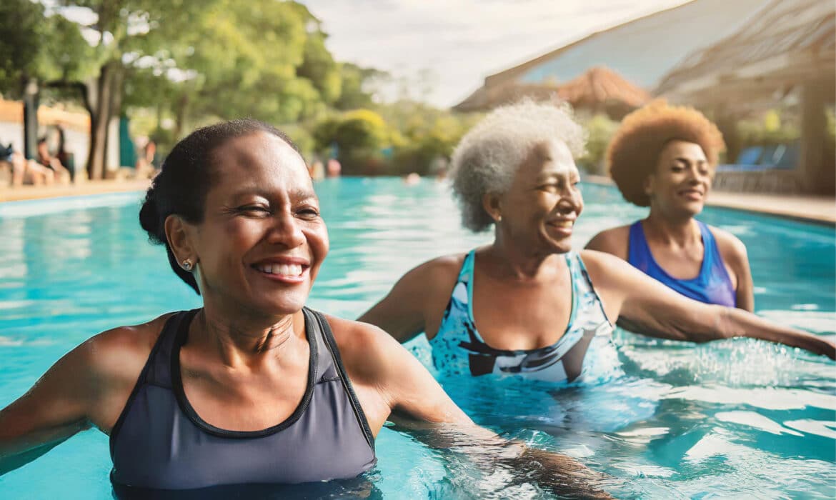 Three women in a pool changing their exercise routine, avoiding a workout rut