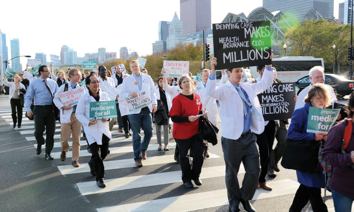 Protesters march for medicare for all. Courtesy of Physicians for a National Health Program