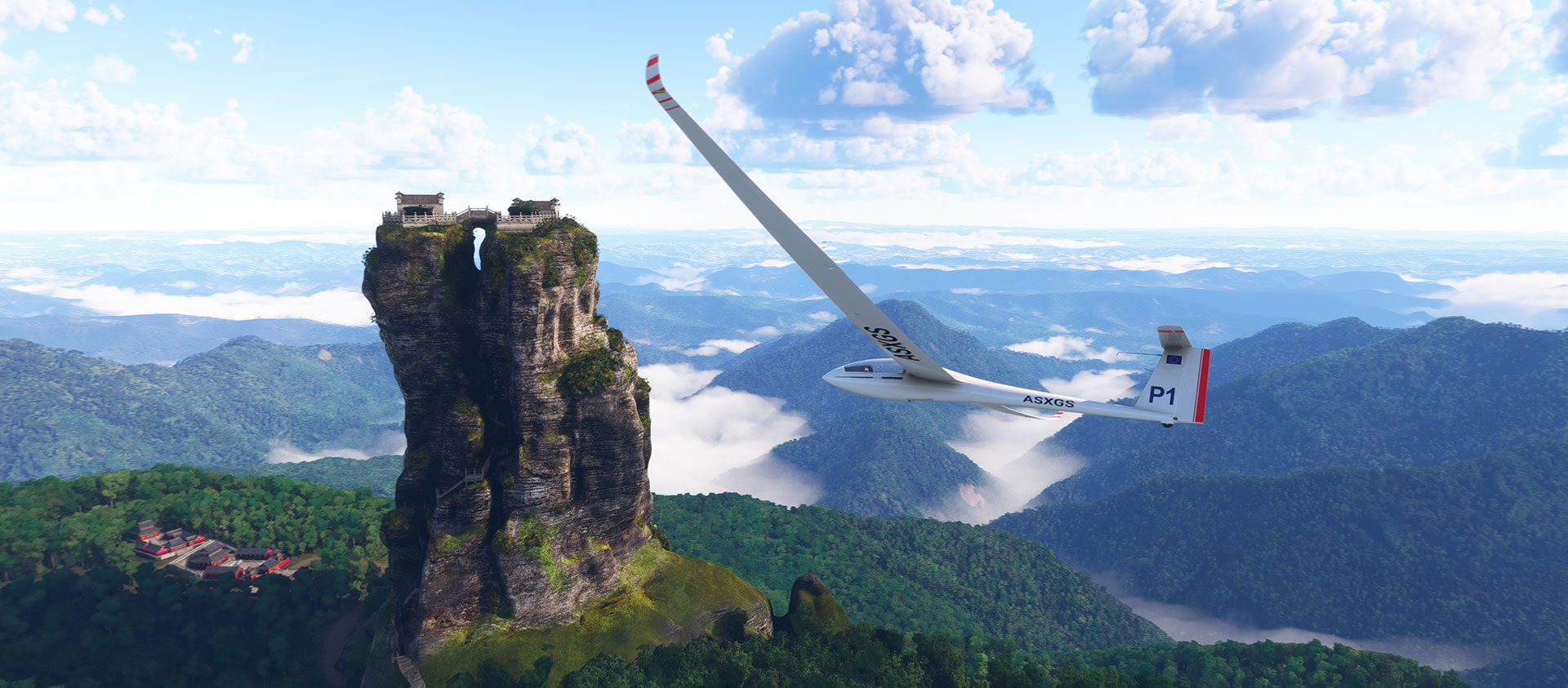 A small plane flies high over green mountains.