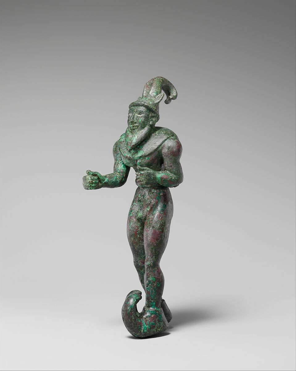 Striding figure with ibex horns, a raptor skin draped around the shoulders, and upturned boots, Copper alloy, shell, Proto-Elamite