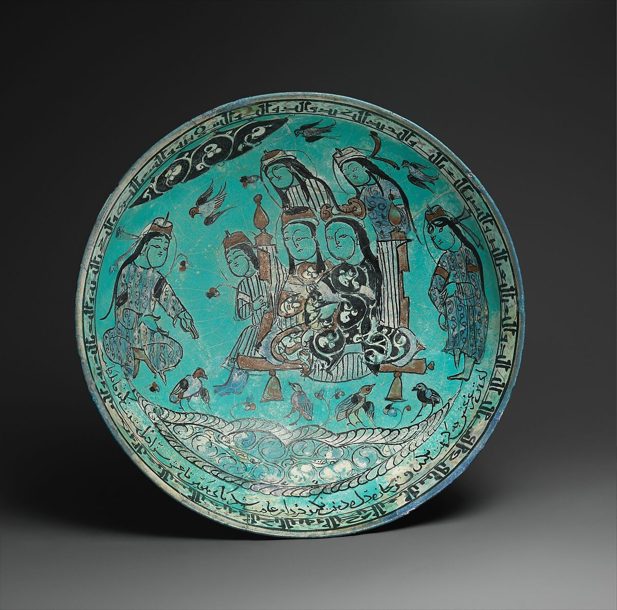 Bowl with a Majlis Scene by a Pond, Abu Zayd al-Kashani (Iranian), Stonepaste; glazed in opaque turquoise, polychrome in-glaze- and overglaze- painted 