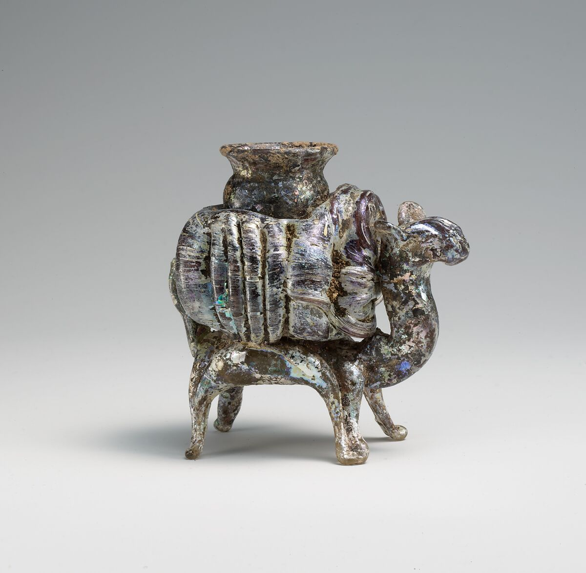 Animal flask, Glass, yellowish and pinkish; blown, applied decoration