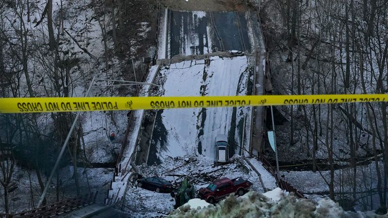 topicsfuture | Photo: A crane hoists a bus that was trapped on the Fern Hollow Bridge when it collapsed; Gene J. Puskar/A.P.