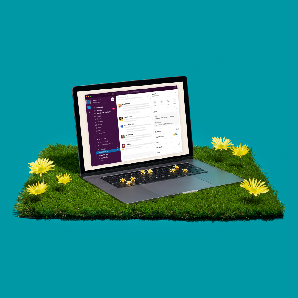 A laptop in the grass, representing the ability to work from anywhere