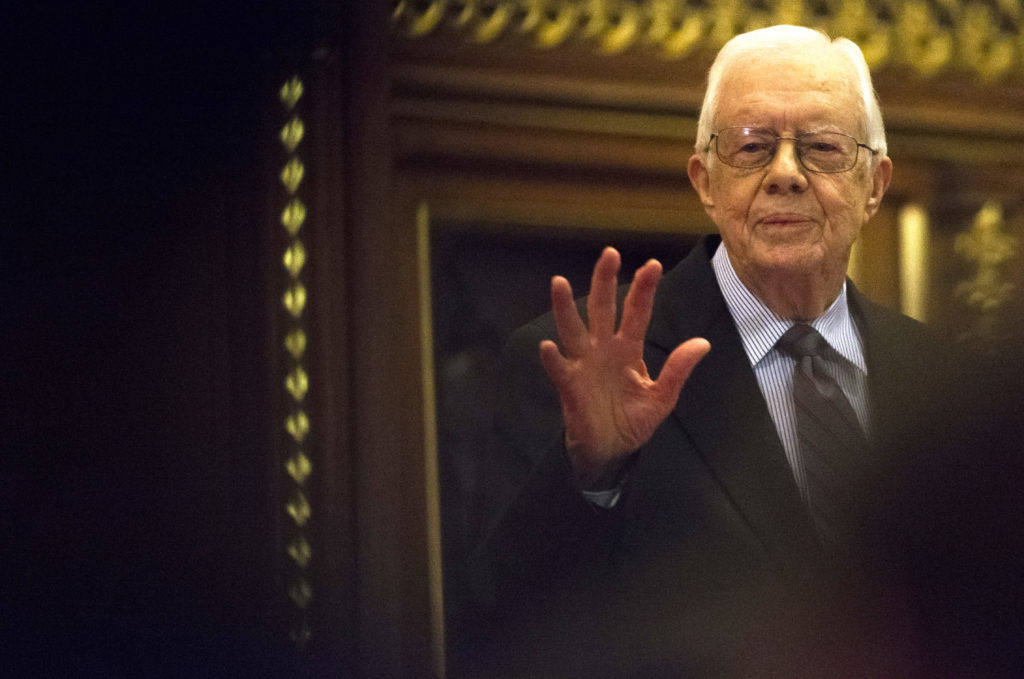 Former U.S. President Jimmy Carter delivers a lecture on the eradication of the Guinea worm, at the House of Lords in London