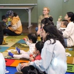 Families with young children enjoying storytime.