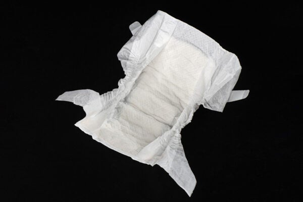 Baby Paper Diapers on Black Background