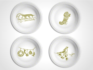 4-piece dinnerware set featuring vintage gold Christmas images | Illustration Design by Vicez