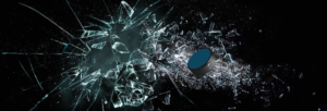 Flying hockey puck shattering glass | Graphic Design by SAI DESIGNS