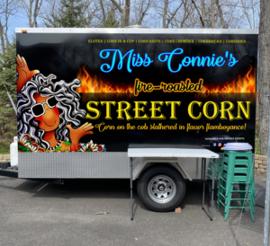 Miss Connie's Fire-Roasted Street Corn Concession Trailer Logo Wraps | Car Wrap Design by Javelin Studio