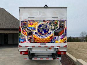 Arcade Game Delivery Truck Wrap | Car Wrap Design by Maestroto