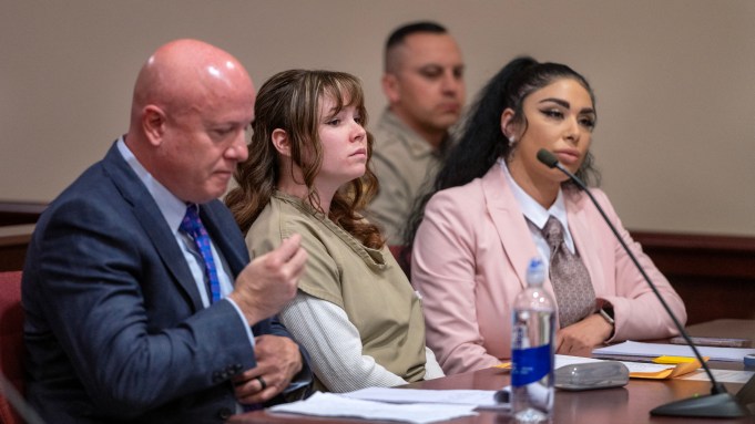 Hannah Gutierrez-Reed (C) attends her sentencing April 15, 2024 hearing in Santa Fe, NM with attorney Jason Bowles (L) and paralegal Carmella Sisneros (R)