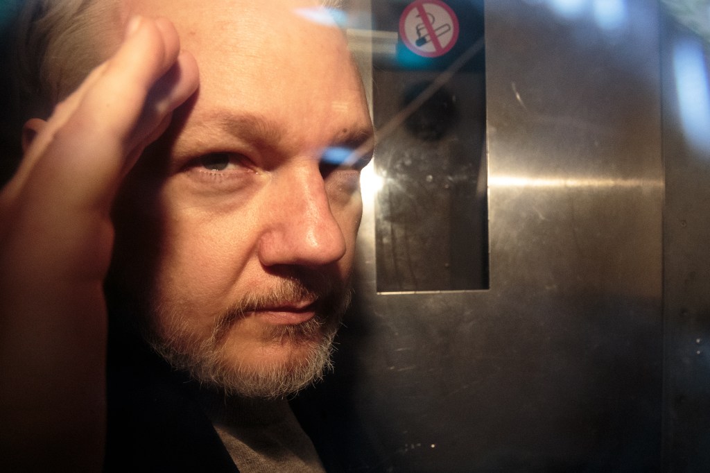 Julian Assange in 2019 after being sentenced in UK court for beaching bail conditions