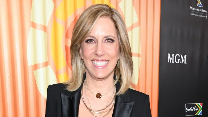 Alisyn Camerota poses on a red carpet.