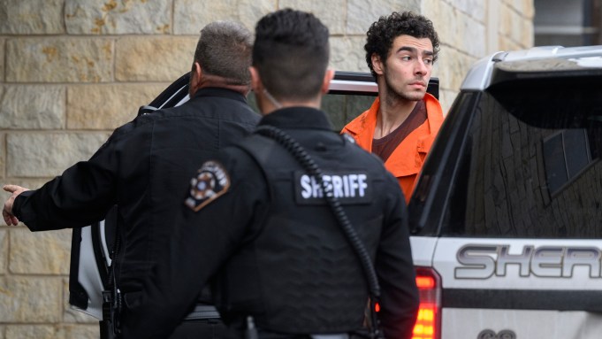 Suspected shooter Luigi Mangione is led into the Blair County Courthouse for an extradition hearing December 10, 2024 in Hollidaysburg, Pennsylvania.