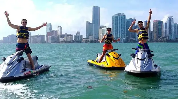 Three people on jet skis in Biscayne Bay 