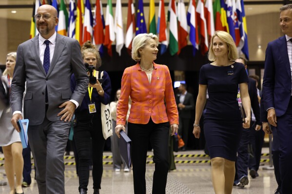 From left, European Council President Charles Michel, European Commission President Ursula von der Leyen, Estonia's Prime Minister Kaja Kallas and Belgium's Prime Minister Alexander De Croo walk together to a media conference at an EU summit in Brussels, early Friday, June 28, 2024. European Union leaders signed off a trio of top appointments for their shared political institutions on Thursday evening, reinstalling German conservative Ursula von der Leyen as president of the European Commission for another five years. At the side of von der Leyen should be two new faces: Antonio Costa of Portugal as European Council President and Estonia's Kaja Kallas as the top diplomat of the world's largest trading bloc. (AP Photo/Geert Vanden Wijngaert)