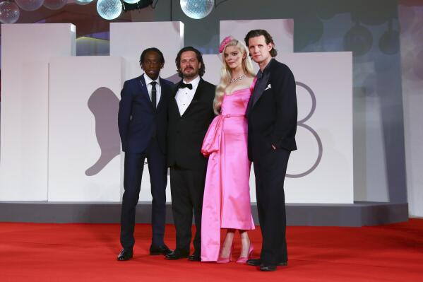Michael Ajao, from left, Edgar Wright, Anya Taylor-Joy and Matt Smith pose for photographers upon arrival at the premiere of the film ' Last Night in Soho' during the 78th edition of the Venice Film Festival in Venice, Italy, Saturday, Sep, 4, 2021. (Photo by Joel C Ryan/Invision/AP)