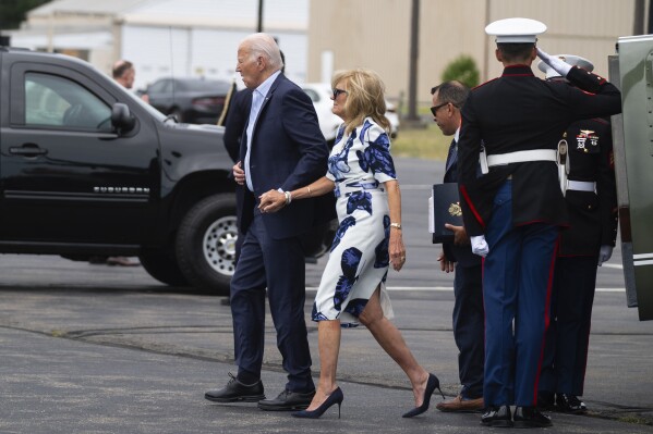 President Joe Biden, left, and first lady Jill Biden arrive at East Hampton Airport, Saturday, June 29, 2024, in East Hampton, N.Y. (AP Photo/Evan Vucci)