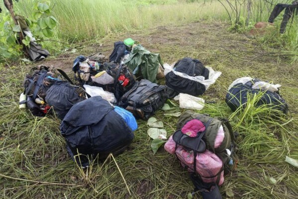 In this handout photo provided by the Armed Forces of the Philippines Public Affairs Office, bags from suspected communist rebels are placed together after an encounter with Philippine troops near a village in Pantabangan town in Nueva Ecija province, Philippines Wednesday June 26, 2024. Philippine troops killed several suspected communist guerrillas in a clash in a remote northern area in the latest blow to a decades-old insurgency that has weakened considerably, with only about a thousand guerrillas remaining, military and security officials said Friday, June 28. (Armed Forces of the Philippines Public Affairs Office via AP)