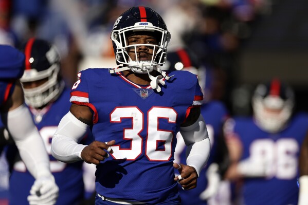 FILE - New York Giants safety Tony Jefferson (36) takes the field to face the Washington Commanders in an NFL football game Sunday, Dec. 4, 2022, in East Rutherford, N.J. Jefferson has come out of retirement to sign with the Los Angeles Chargers. The team announced the signing of the veteran safety on Friday, June 14, 2024. Jefferson had a tryout during the Chargers' minicamp, which concluded Thursday. (AP Photo/Adam Hunger, File)