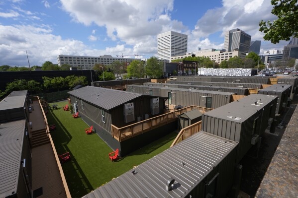The gated micro community known as “The Melody” is shown Friday, April 12, 2024, in Atlanta. The Melody is a housing complex made from shipping containers and is intended to help house people from Atlanta's homeless population. (AP Photo/John Bazemore)