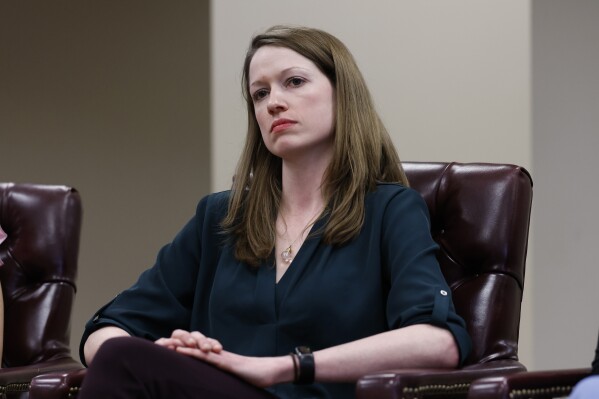 Dr Rachel Charles tells her story as Secretary of U.S. Health and Human Services, Xavier Becerra hosts a panel discussion with families directly affected by the Alabama Supreme Court Court decision, Tuesday, Feb. 27, 2024, in Birmingham, Ala. (AP Photo/ Butch Dill)
