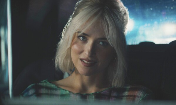 This image released by Sony Pictures Classics shows Dakota Johnson in a scene from "Daddio." (Sony Pictures Classics via AP)