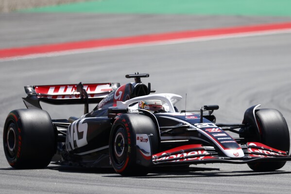 Haas driver Kevin Magnussen of Denmark steers his car during the 3rd practice session for the Formula 1 Spanish Grand Prix at the Barcelona Catalunya racetrack in Montmelo, near Barcelona, Spain, Saturday, June 22, 2024. The race will be held on Sunday. (AP Photo/Joan Monfort)