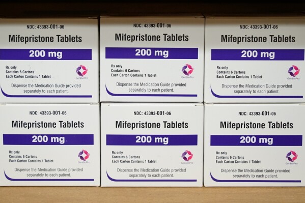 FILE - Boxes of the drug mifepristone sit on a shelf at the West Alabama Women's Center in Tuscaloosa, Ala., on March 16, 2022. The Supreme Court on Thursday, June 13, 2024, unanimously preserved access to the medication that was used in nearly two-thirds of all abortions in the U.S. last year, in the court’s first abortion decision since conservative justices overturned Roe v. Wade two years ago. (AP Photo/Allen G. Breed, File)