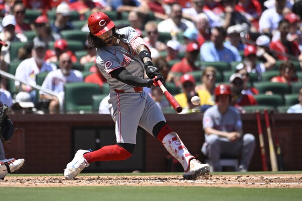 Cincinnati Reds' Jonathan India hits an RBI ground rule double in the third inning of a baseball game against the St. Louis Cardinals, Saturday, June 29, 2024, in St. Louis. (AP Photo/Joe Puetz)