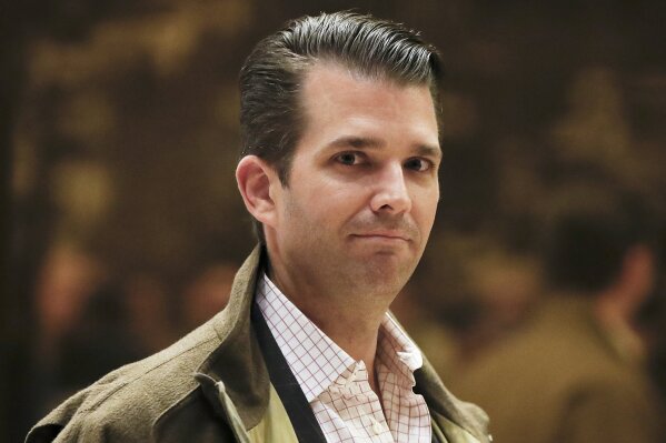 
              FILE - In a Wednesday, Nov. 16, 2016 file photo, Donald Trump Jr., son of President-elect Donald Trump, walks from the elevator at Trump Tower, in New York.  Donald Trump Jr. told the Senate Judiciary Committee that he couldn't remember whether he had discussed the Russia investigation with his father, according to transcripts released Wednesday of his interview with the panel.
  (AP Photo/Carolyn Kaster, File)
            