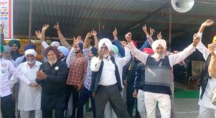 Farmers dance to music at the Shambhu border, separating Haryana's Ambala and Punjab's Patiala, after PM Modi's announcement.